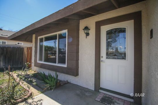 237 South American Street Ridgecrest, CA 93555 - Photo 2 of 26 a front view of a house
