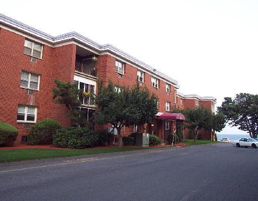 185 Melba Street, Unit 307 Milford, CT 06460 - Photo 1 of 1 a front view of a multi story building