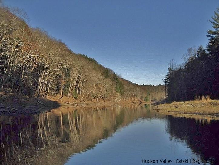145 Beaverkill Road Kingston, NY 12401 - Photo 23 of 28 a view of a lake with a mountain in the background