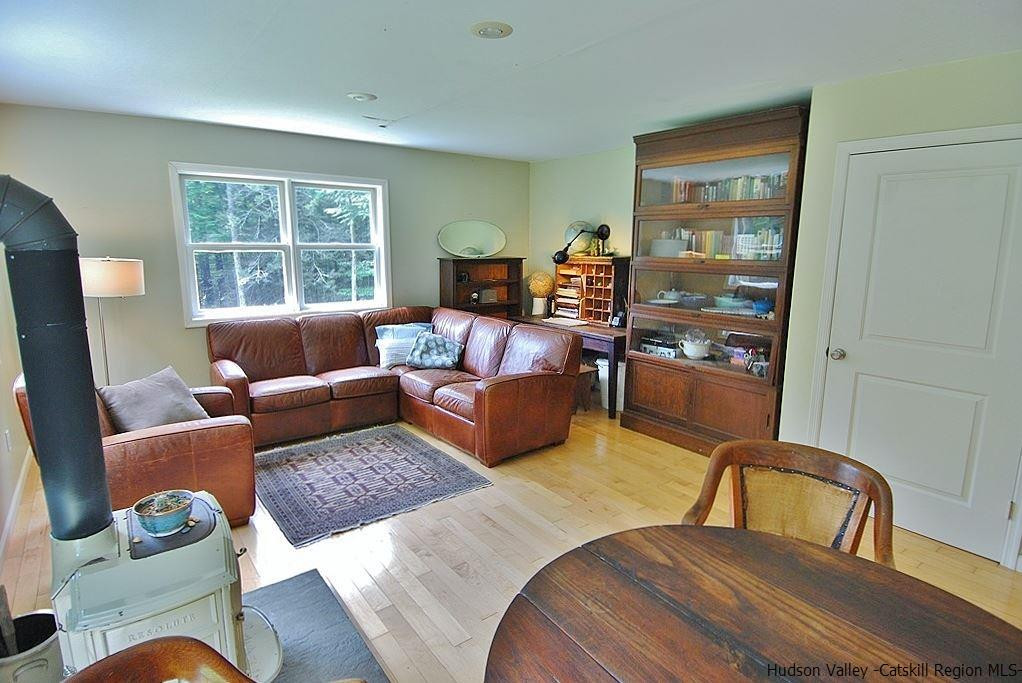 145 Beaverkill Road Kingston, NY 12401 - Photo 8 of 28 a living room with furniture and a window