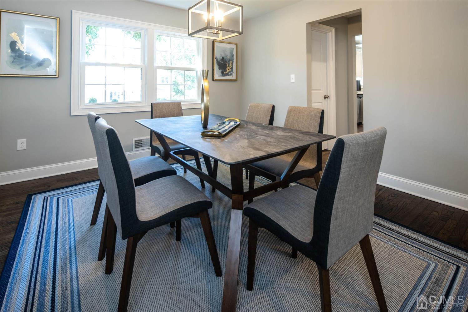50 Meredith Road Edison, NJ 08817 - Photo 14 of 35 a view of a dining room with furniture and window