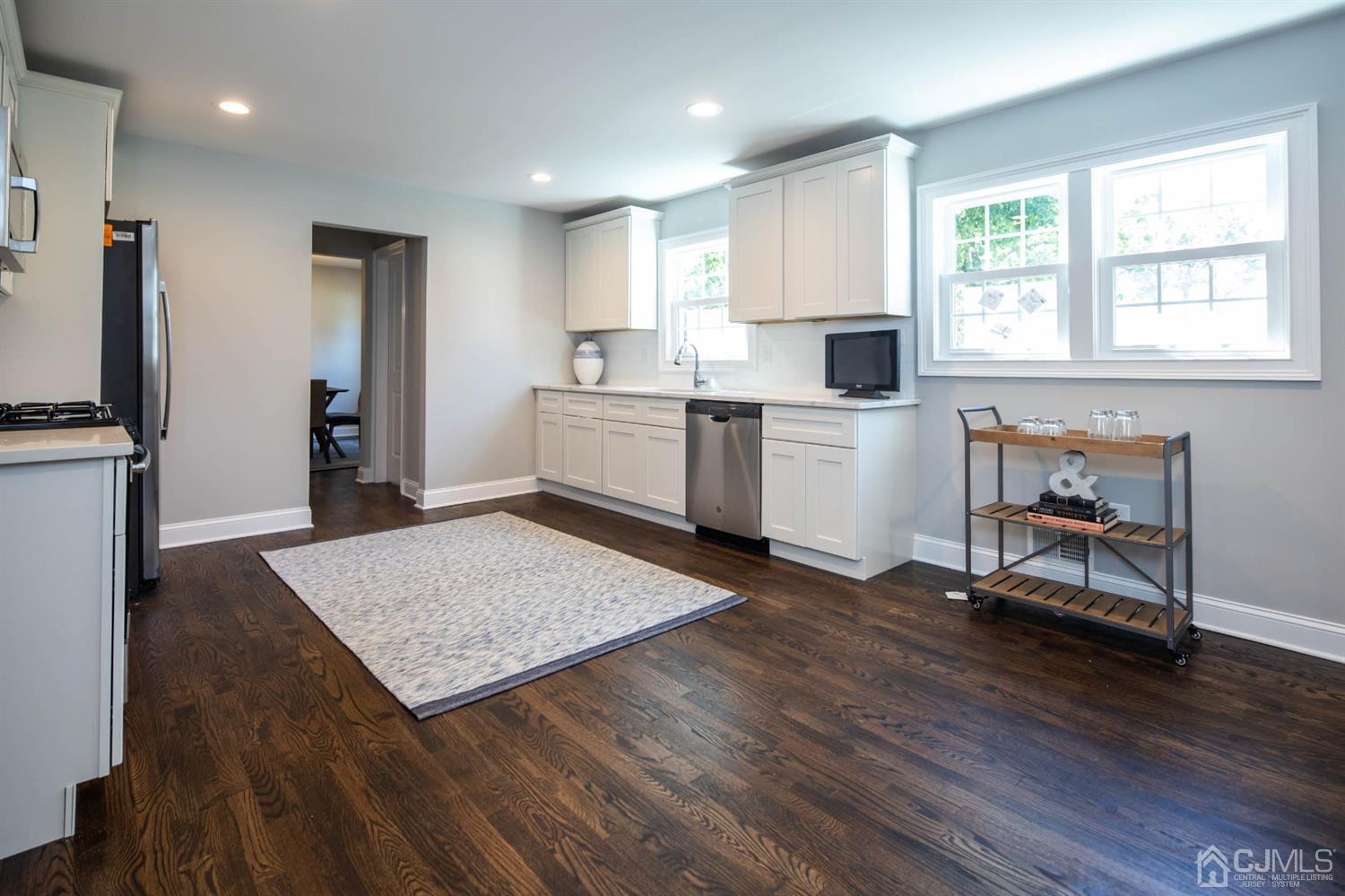 50 Meredith Road Edison, NJ 08817 - Photo 3 of 35 a open kitchen with sink cabinets and wooden floor