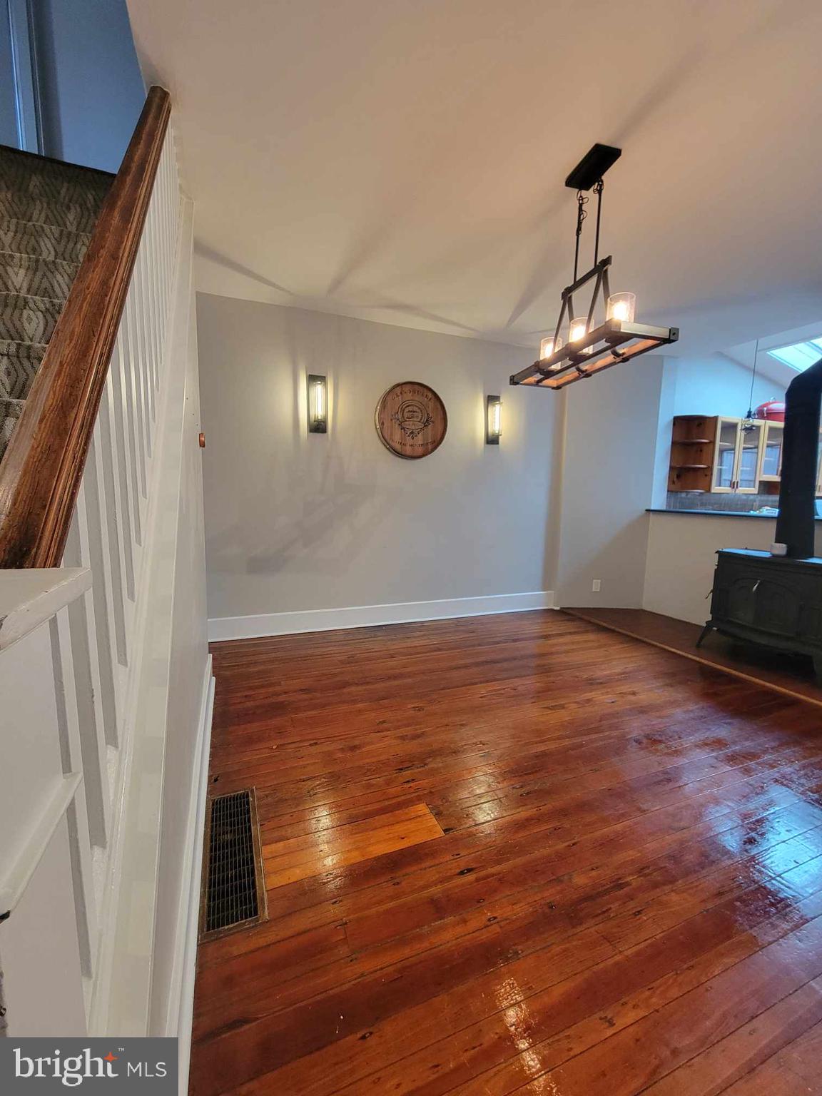 3537 Sunnyside Avenue Philadelphia, PA 19129 - Photo 3 of 12 a view of a room with wooden floor and staircase