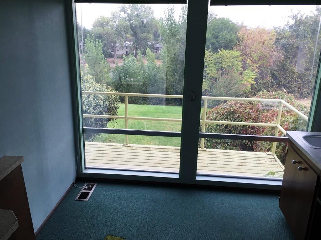810 Rio Street Red Bluff, CA 96080 - Photo 23 of 31 a view of a porch with a table and chair