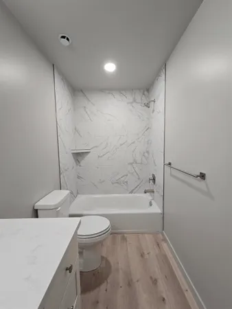 a view of an empty walk in closet