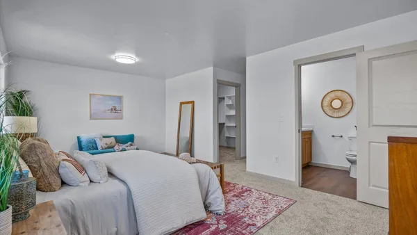 a room with water heater and utility room