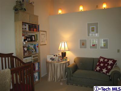 Undisclosed Address Burbank, CA 91501 - Photo 17 of 21 a living room with furniture a window and a flat screen tv