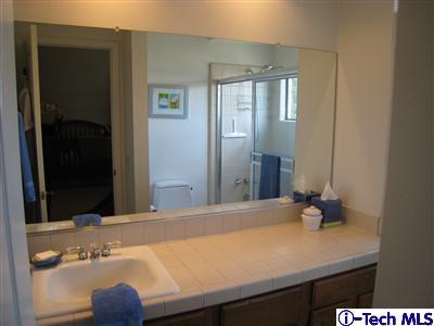 Undisclosed Address Burbank, CA 91501 - Photo 18 of 21 a bathroom with a sink vanity and a mirror