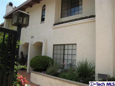 Undisclosed Address Burbank, CA 91501 - Photo 3 of 21 a view of a house with a flower garden