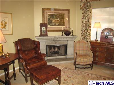 Undisclosed Address Burbank, CA 91501 - Photo 6 of 21 a living room with furniture and a fireplace