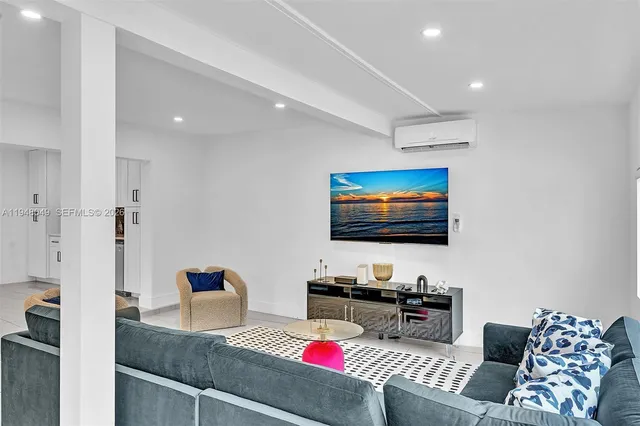 a bathroom with a toilet a sink and a mirror