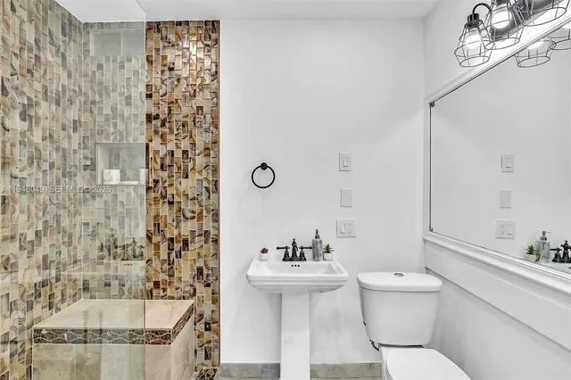 an aerial view of a house with a garden and plants