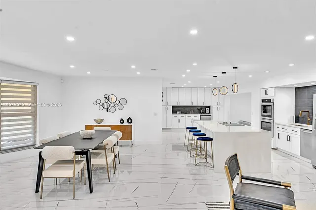 a bathroom with a toilet and sink