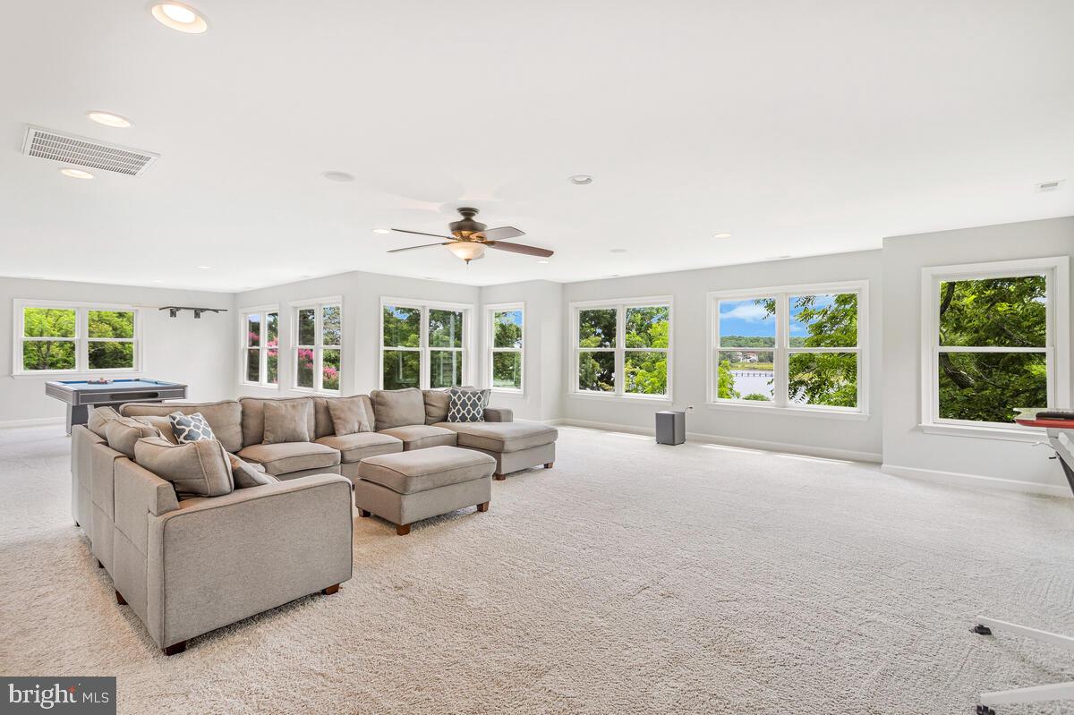 50333 Scotland Beach Road Scotland, MD 20687 - Photo 45 of 95 a living room with furniture and a large window