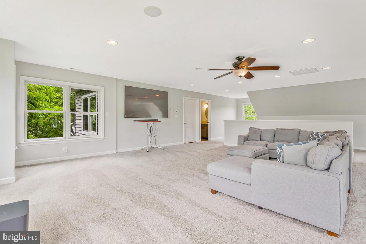 50333 Scotland Beach Road Scotland, MD 20687 - Photo 48 of 95 a living room with furniture and a large window