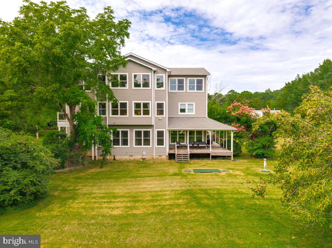 50333 Scotland Beach Road Scotland, MD 20687 - Photo 60 of 95 a view of a house with a swimming pool