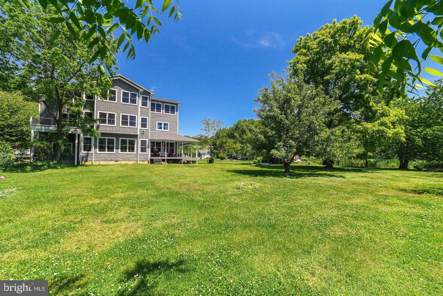 50333 Scotland Beach Road Scotland, MD 20687 - Photo 92 of 95 a view of a house with a big yard