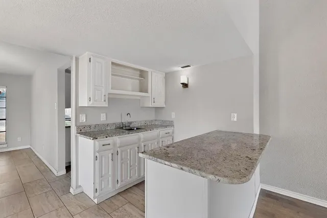 a view of a livingroom with a staircase