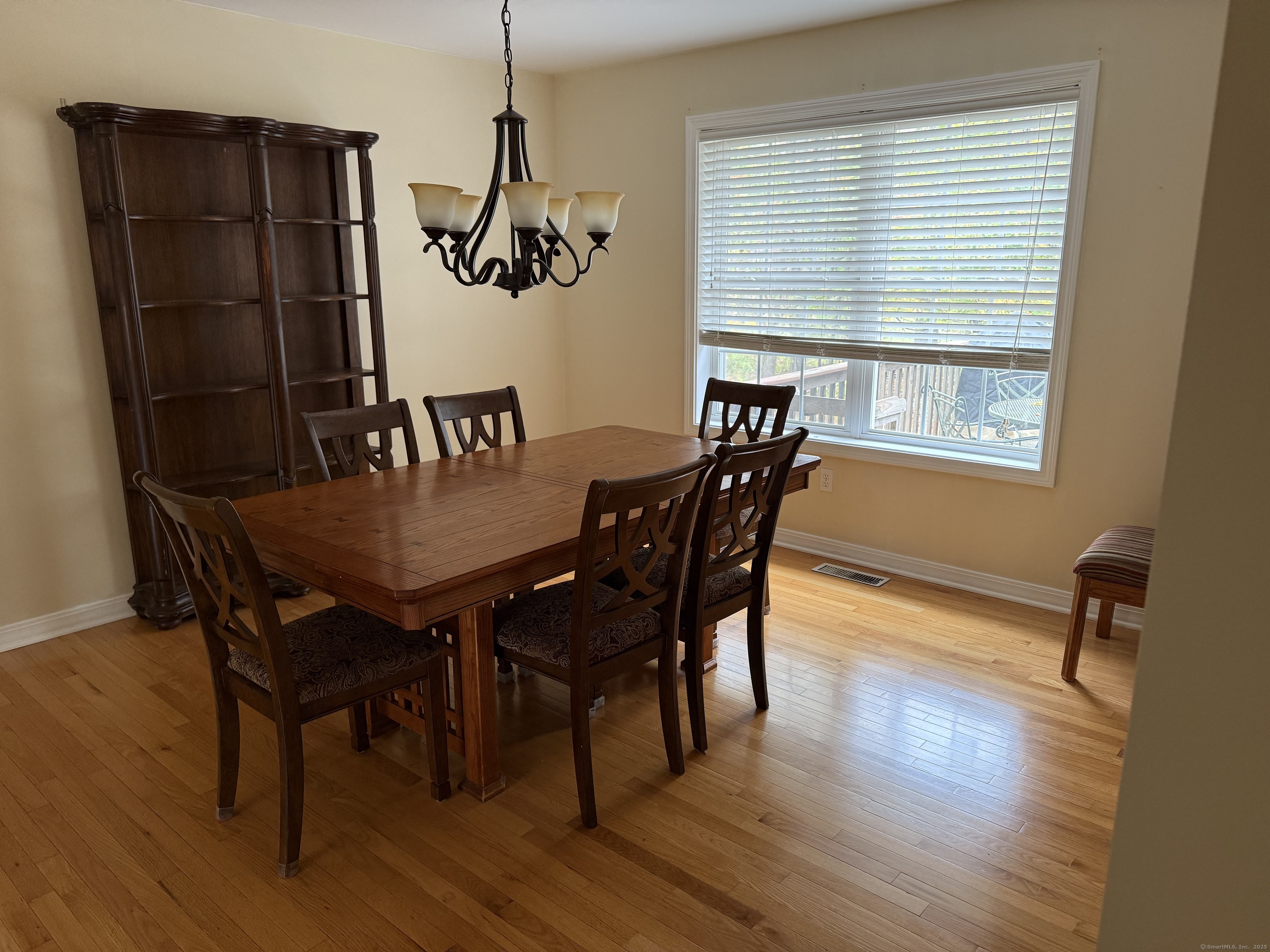1130 Hanover Avenue Meriden, CT 06451 - Photo 3 of 11 a view of a dining room with furniture and window