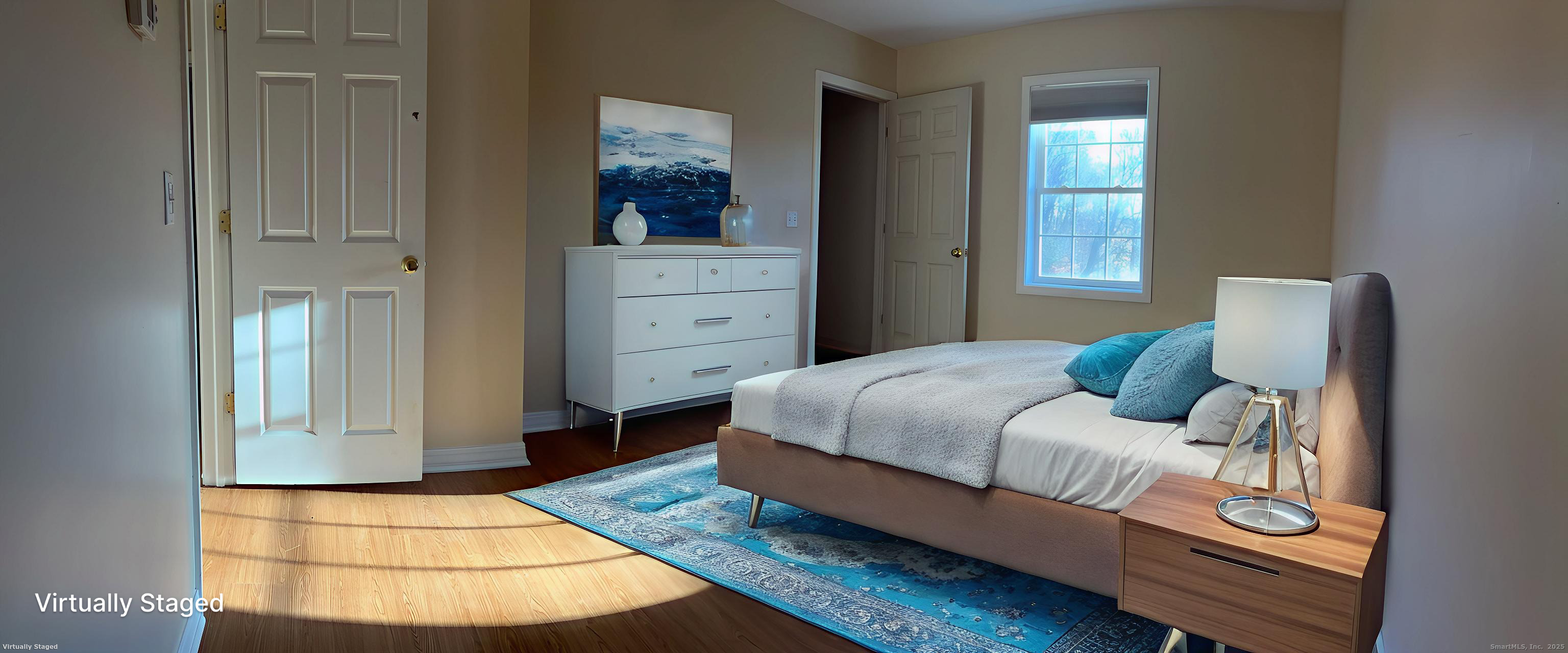 1130 Hanover Avenue Meriden, CT 06451 - Photo 8 of 11 a bedroom with a bed and window