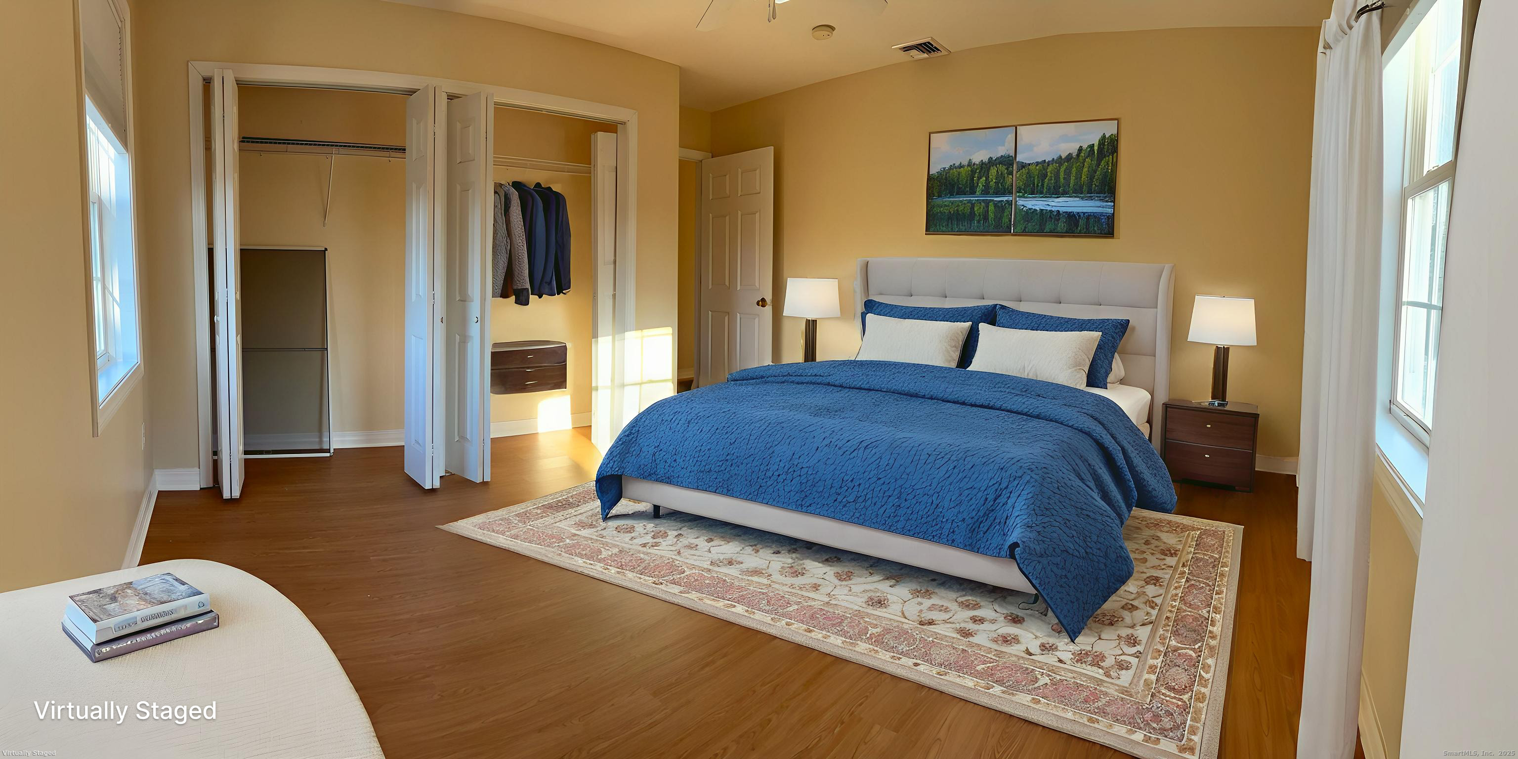 1130 Hanover Avenue Meriden, CT 06451 - Photo 9 of 11 a bedroom with a bed and wooden floor