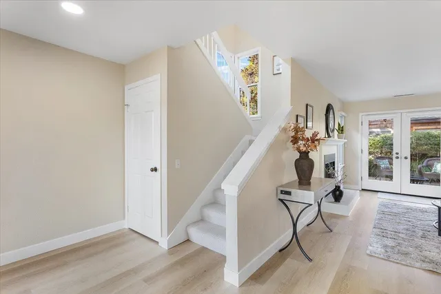 a view of a workspace with furniture