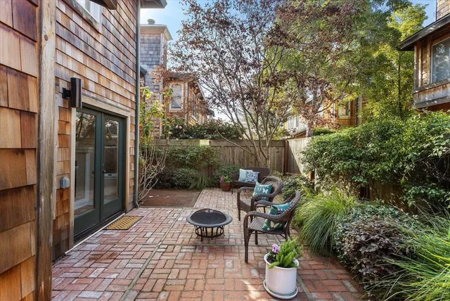 a view of a street with a building in the background