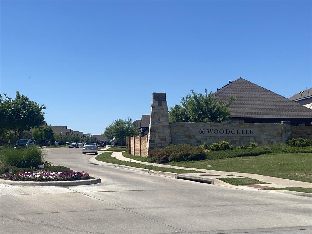 813 Mildren Lane Fate, TX 75087 - Photo 27 of 32 Another view of the Woodcreek entrance