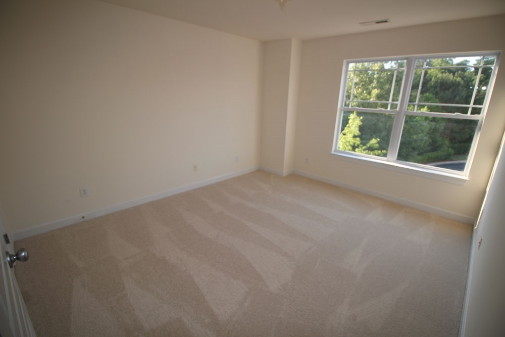 251 Broadgait Brae Road Cary, NC 27519 - Photo 17 of 25 Second Bedroom on Third Level with NEW carpet. Bedroom
