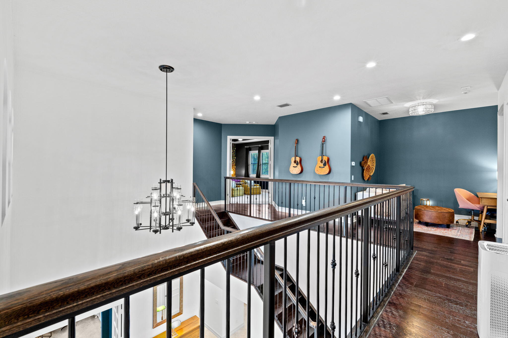 17814 Cadena Drive Boca Raton, FL 33496 - Photo 13 of 46 a view of a hallway with wooden floor and stairs