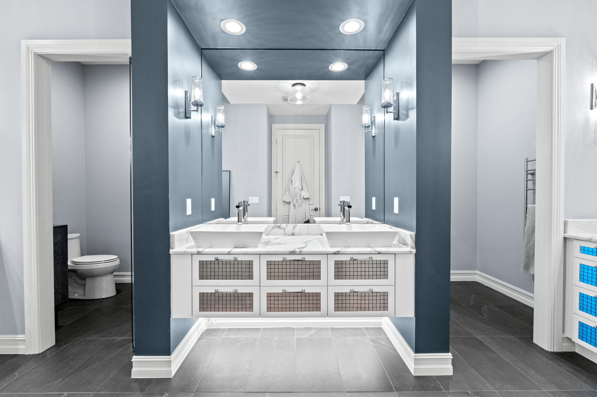 17814 Cadena Drive Boca Raton, FL 33496 - Photo 18 of 46 a view of a double vanity sink and a mirror