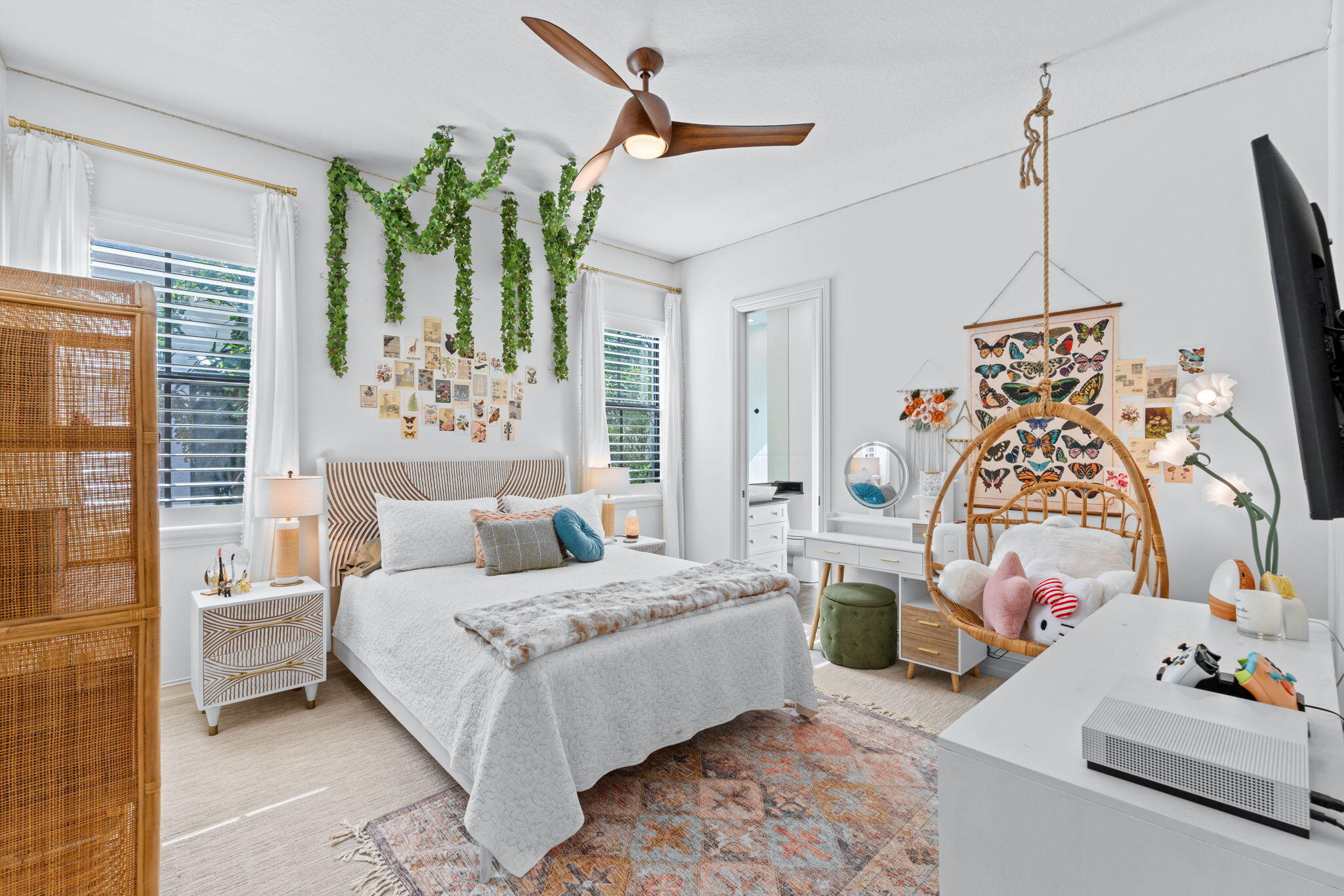 17814 Cadena Drive Boca Raton, FL 33496 - Photo 23 of 46 a bedroom with a bed couch and window