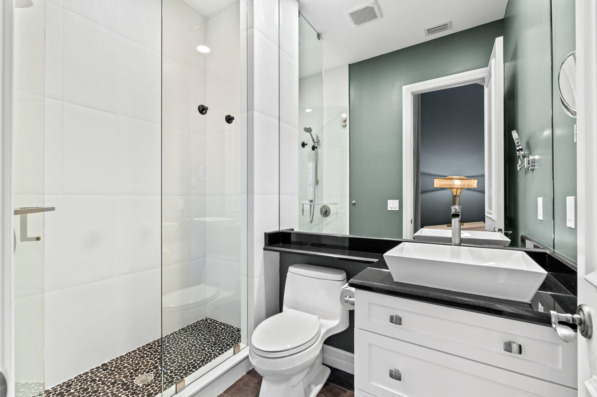 17814 Cadena Drive Boca Raton, FL 33496 - Photo 26 of 46 a bathroom with a sink a toilet and shower