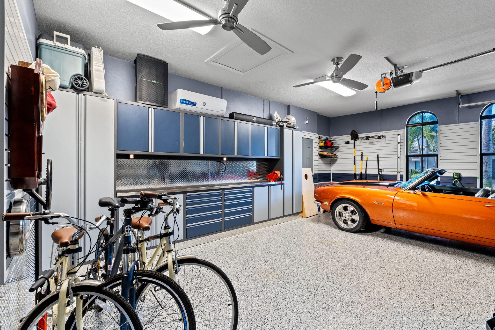 17814 Cadena Drive Boca Raton, FL 33496 - Photo 31 of 46 a car is parked in a garage