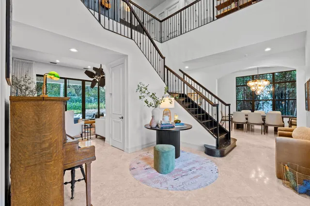 a living room with furniture or stairs and a couch