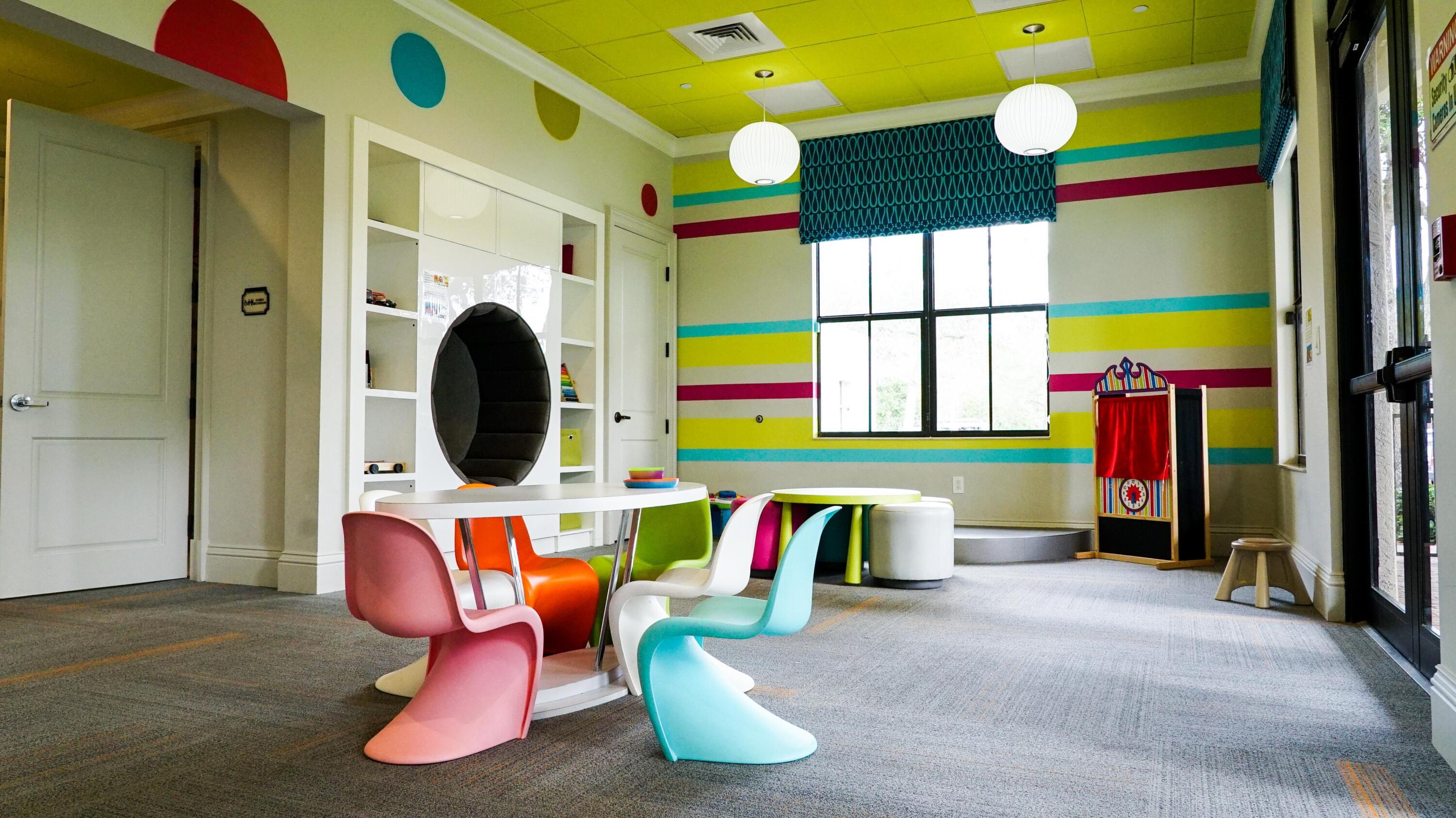 17814 Cadena Drive Boca Raton, FL 33496 - Photo 45 of 46 a living room with kitchen island furniture and a fireplace