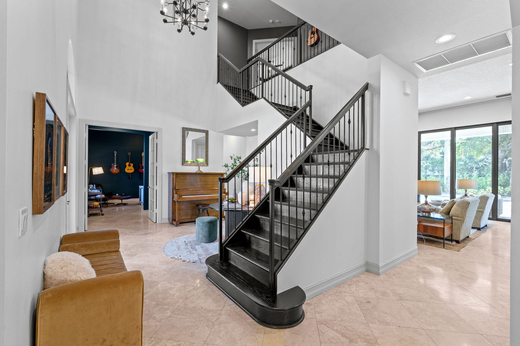 17814 Cadena Drive Boca Raton, FL 33496 - Photo 5 of 46 a living room with furniture or stairs and a couch