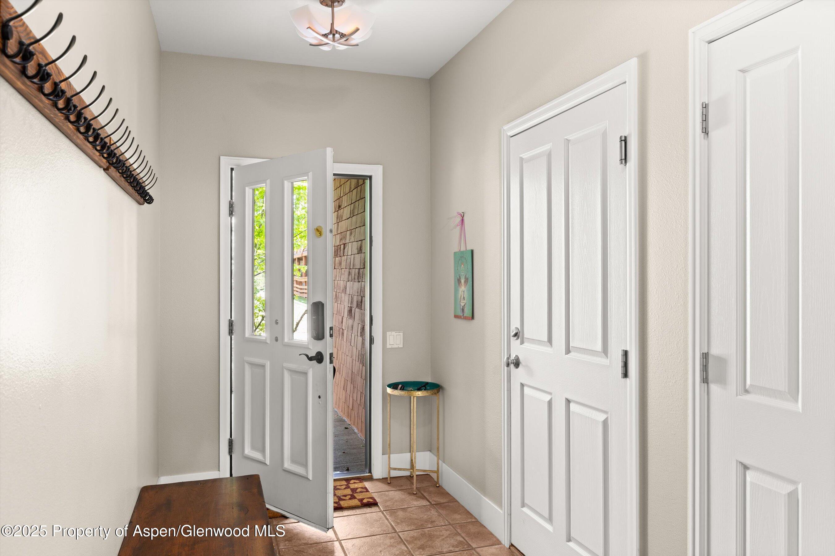 612 Evans Court Basalt, CO 81621 - Photo 13 of 17 a view of entryway with wooden floor