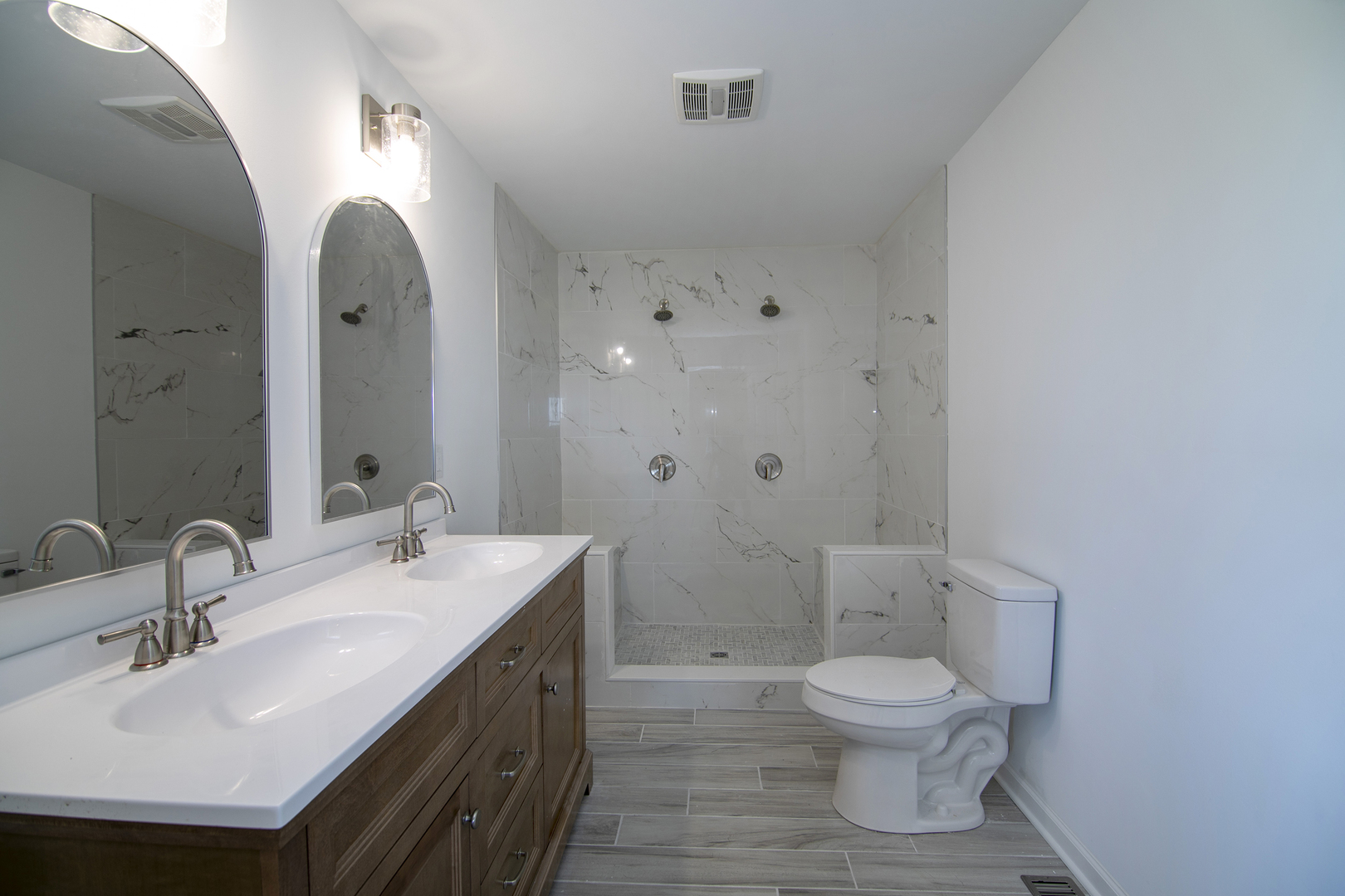 2695 North 1000 East Road Ashkum, IL 60911 - Photo 18 of 31 a bathroom with a sink a toilet and shower