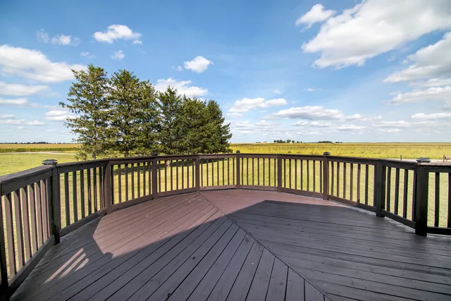 a view of wooden floor with a balcony