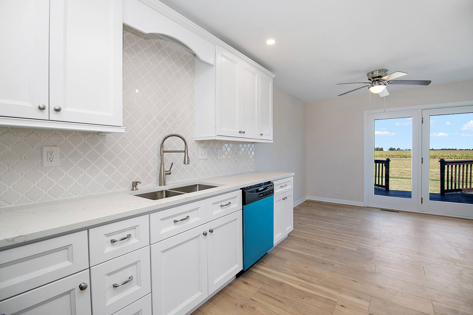 2695 North 1000 East Road Ashkum, IL 60911 - Photo 10 of 31 a kitchen with a sink cabinets and window