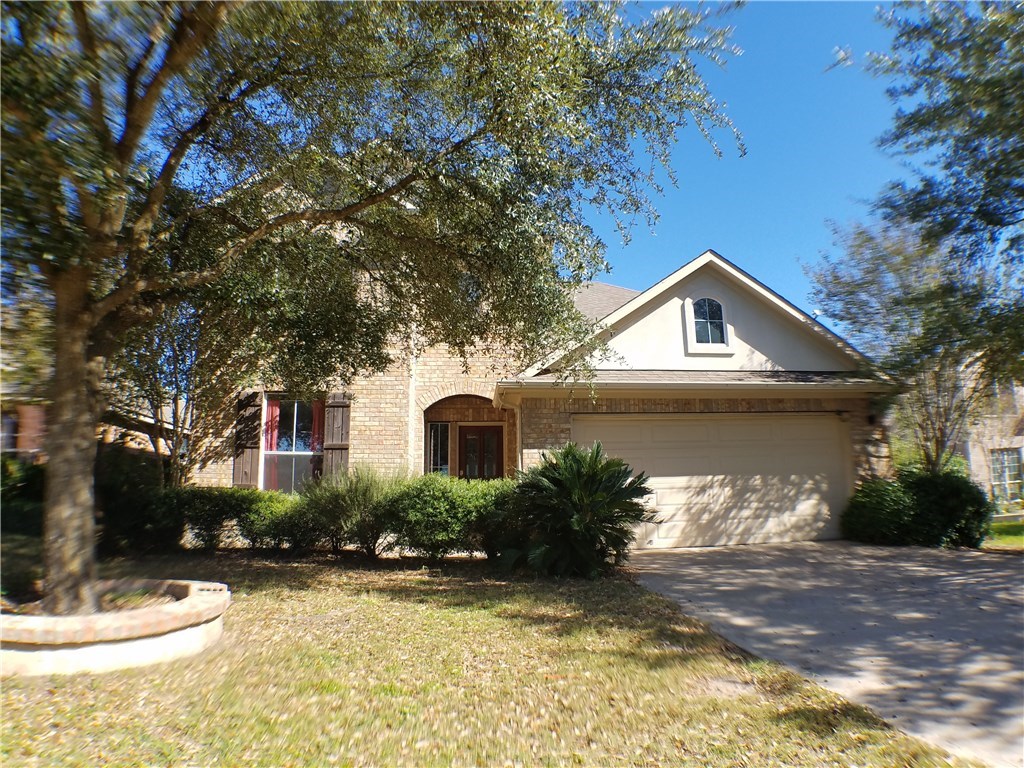 2208 Hayfield Square Pflugerville, TX 78660 - Photo 1 of 29 a front view of a house with a yard