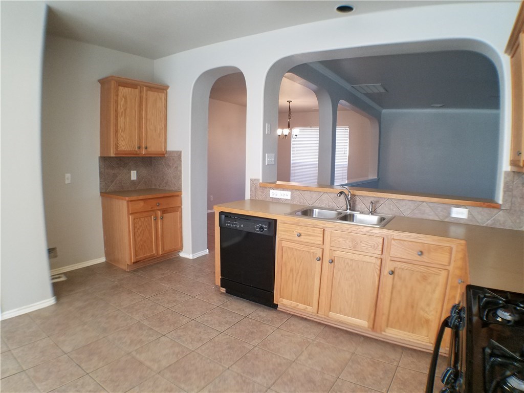 2208 Hayfield Square Pflugerville, TX 78660 - Photo 13 of 29 a spacious bathroom with a double vanity sink and a mirror