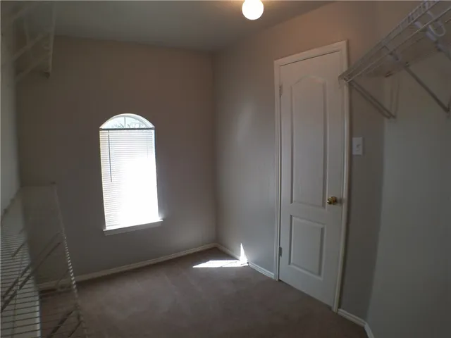 a view of empty room with window