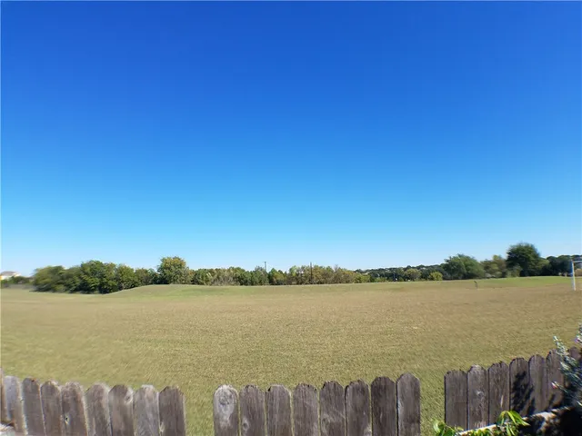 a view of a lake from a city