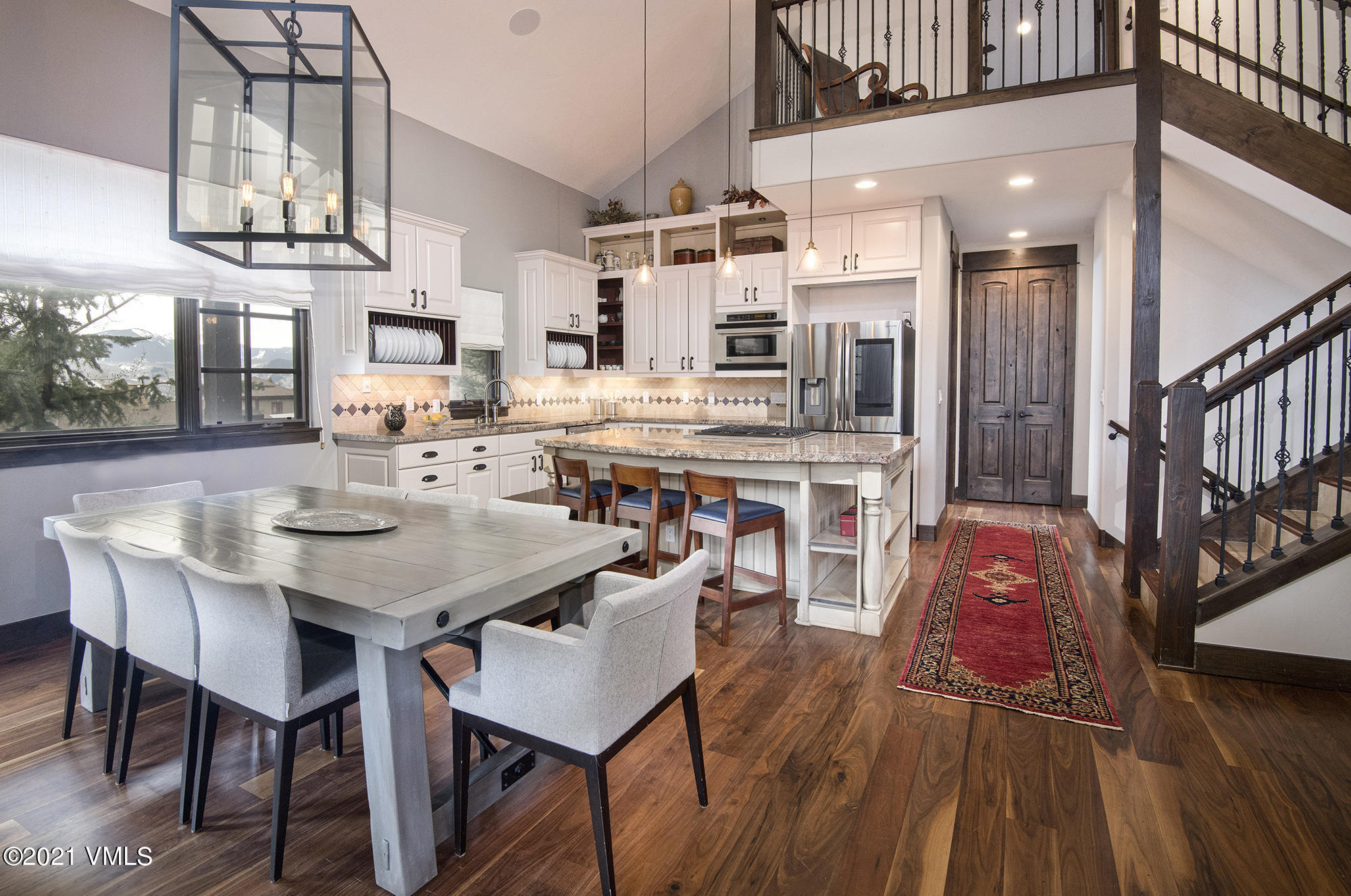 5691 Wildridge Road East Avon, CO 81620 - Photo 44 of 45 Open floor plan with vaulted ceilings