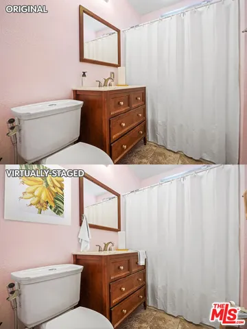 a bathroom with a toilet sink and vanity