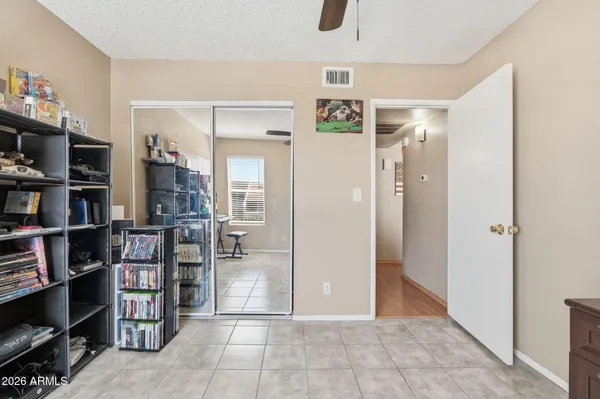 a view of empty room with shelves