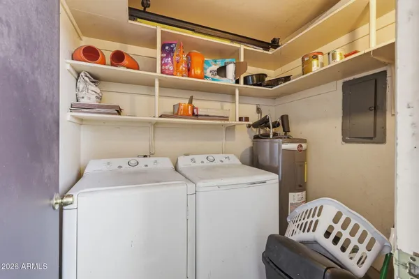 a utility room with dryer and washer