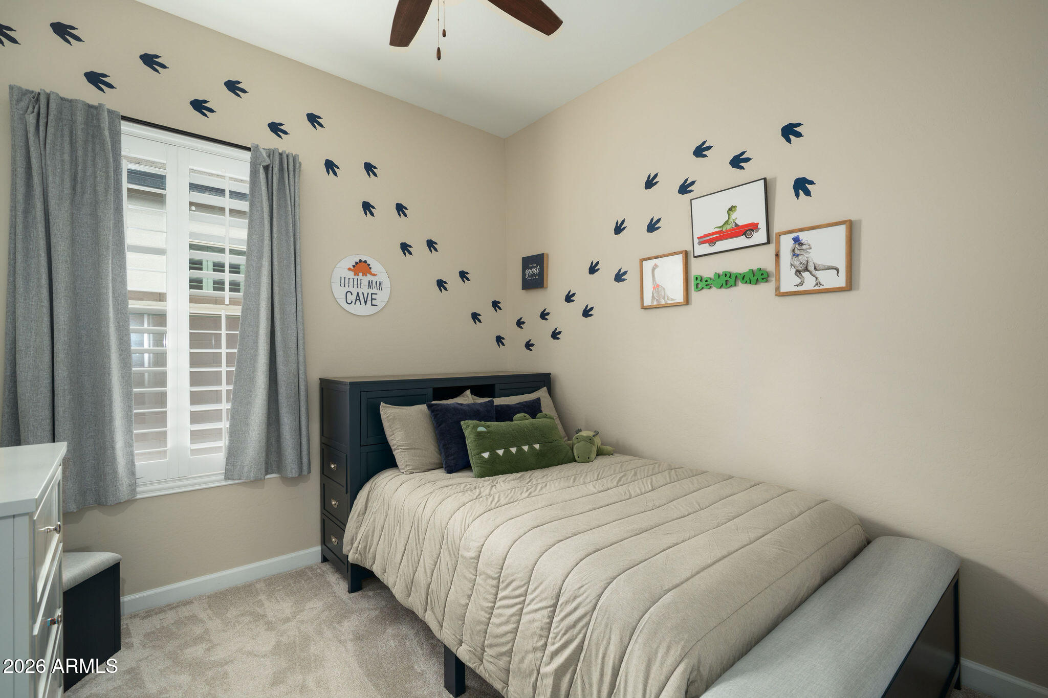 18236 North 66th Way Phoenix, AZ 85054 - Photo 11 of 17 a bedroom with a bed and a window
